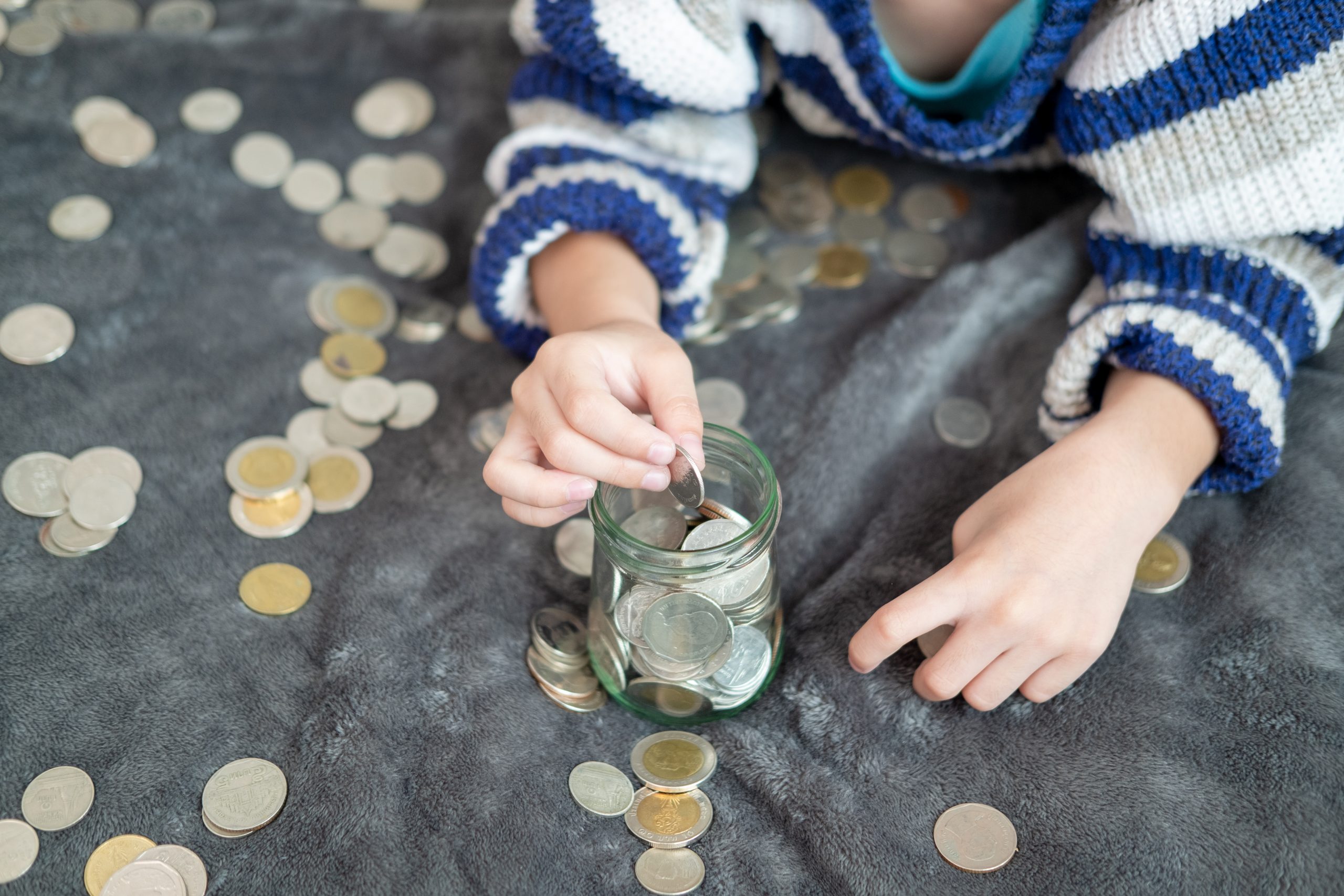 7 Fun and Easy Ways to Teach Kids About Money at Home